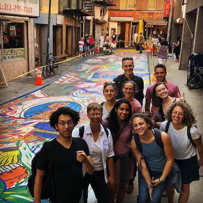 Immigrant New York Tour with group on Doyer Street in Chinatown